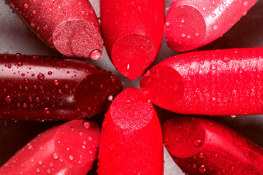 A row of red and berry lipstick shades