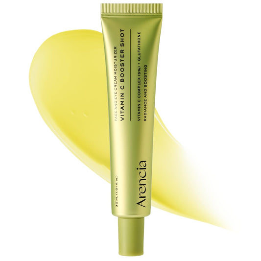 Spotless Glow dark spot whitening cream, 30 ml tube beside a yellow vitamin C cream swatch
